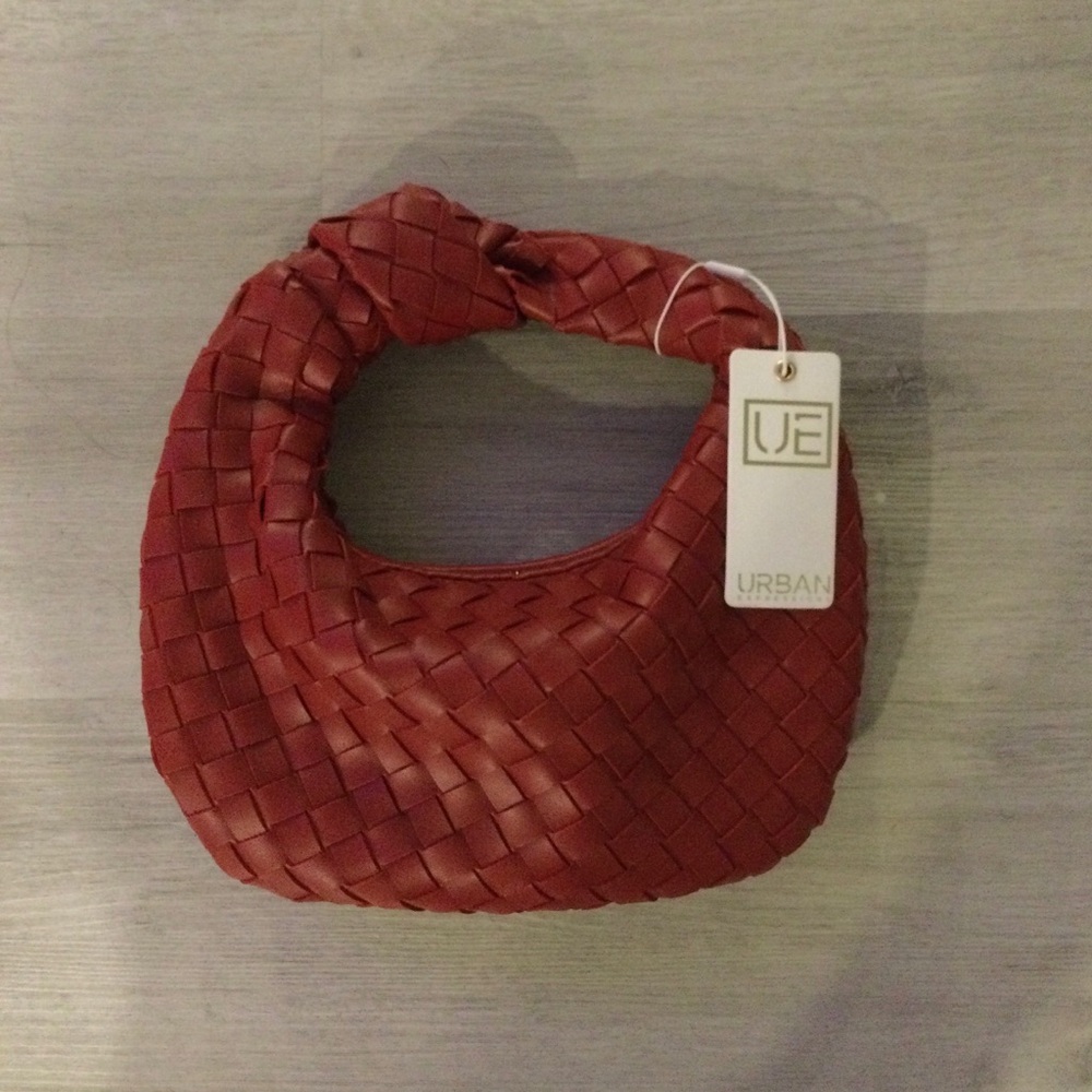 Woven vegan leather knotted handle bag